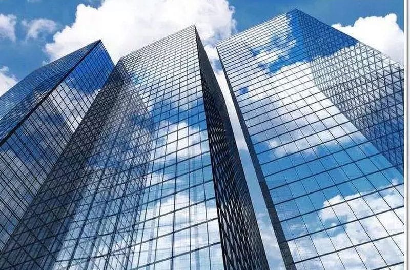 The exterior walls are decorated with glass curtain walls