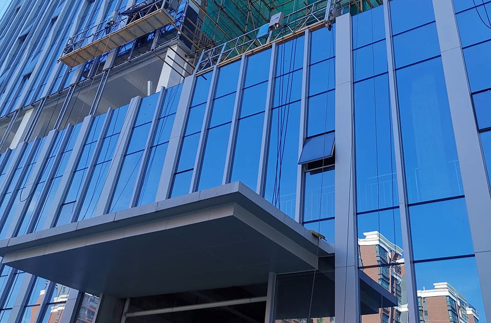 Glass Curtain Wall vs Traditional Windows